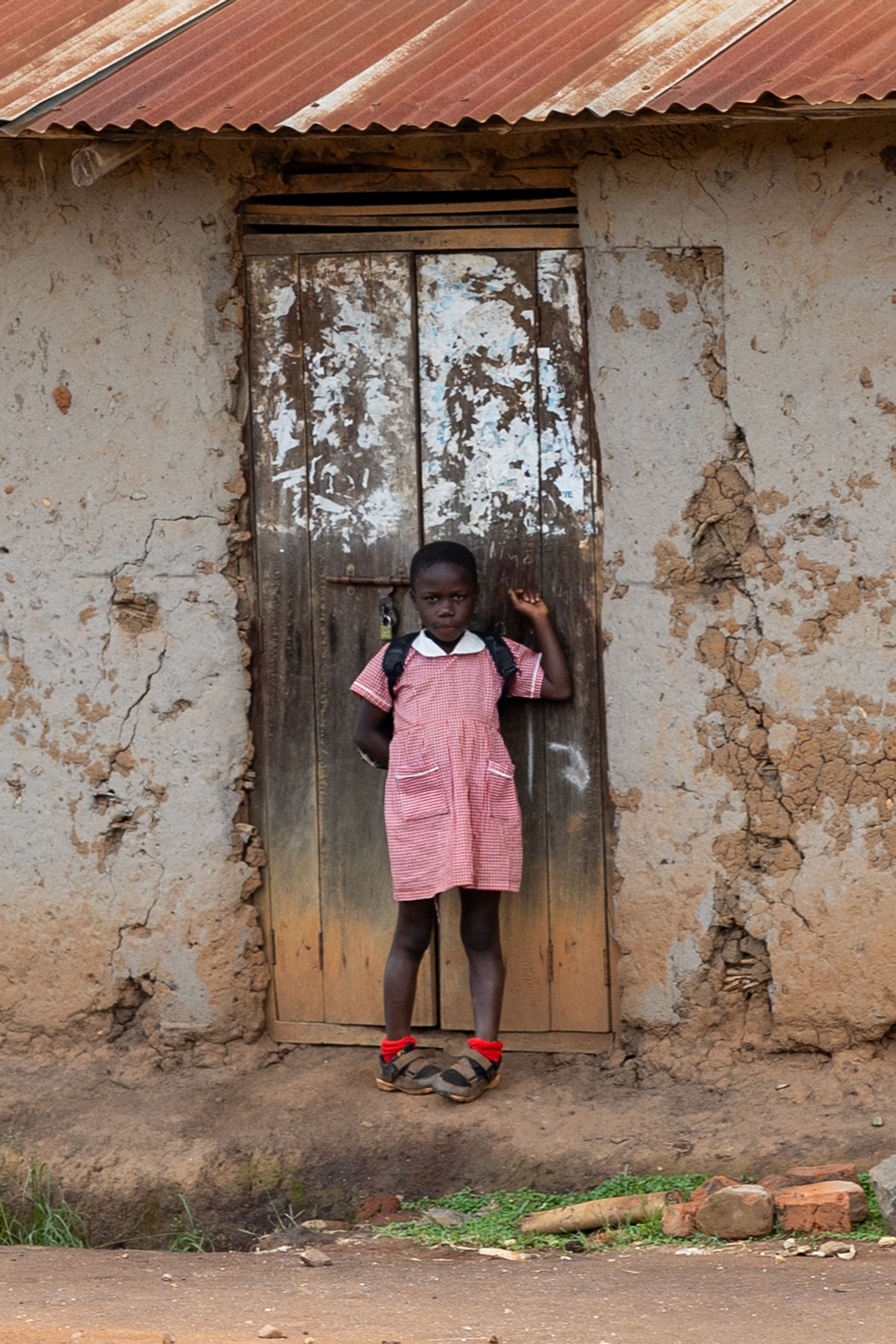 Schoolgirl at Door